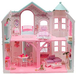 Barbie Deluxe Dream House opened to show two floors, pink rooms, furniture and pale green roof sections