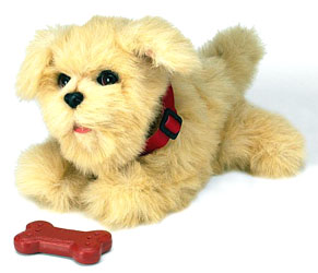 Tan FurReal Friends puppy with red collar, raised tail and a red toy bone beside its front paws.