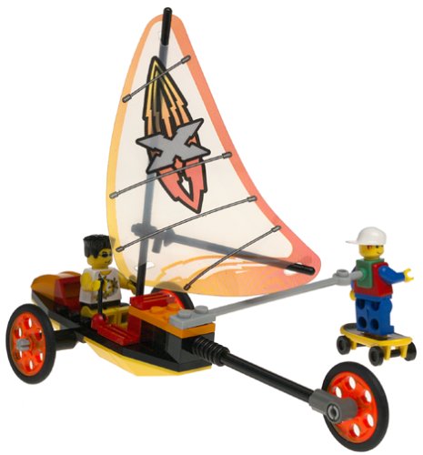 Original LEGO Beach Cruisers model with three wheels, a tall printed sail, a seated figure and another figure on a yellow skateboard.